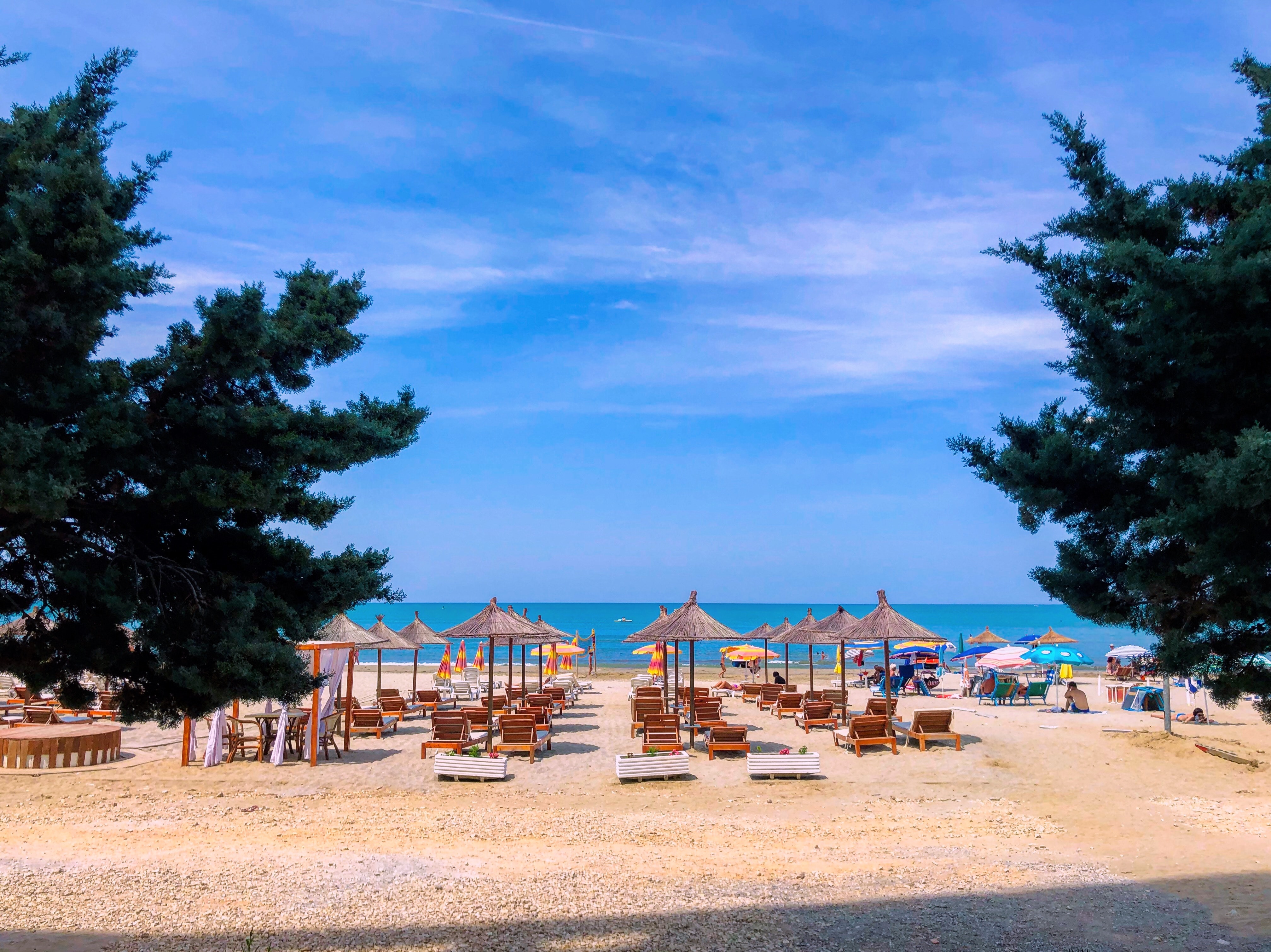 Plazhi Beach in Durres with beach umbrellas and sunbeds
